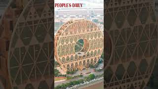 The 138metertall Guangzhou Circle is a landmark building in Guangzhou [upl. by Garwood]