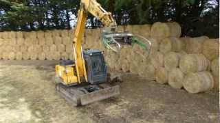 Stacking straw at Walling Contracting [upl. by Ariajaj]